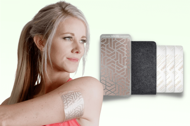 Woman wearing Kailo Pain Patch